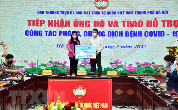 Over VND12 5 billion donated to Hanoi for fight against COVID-19